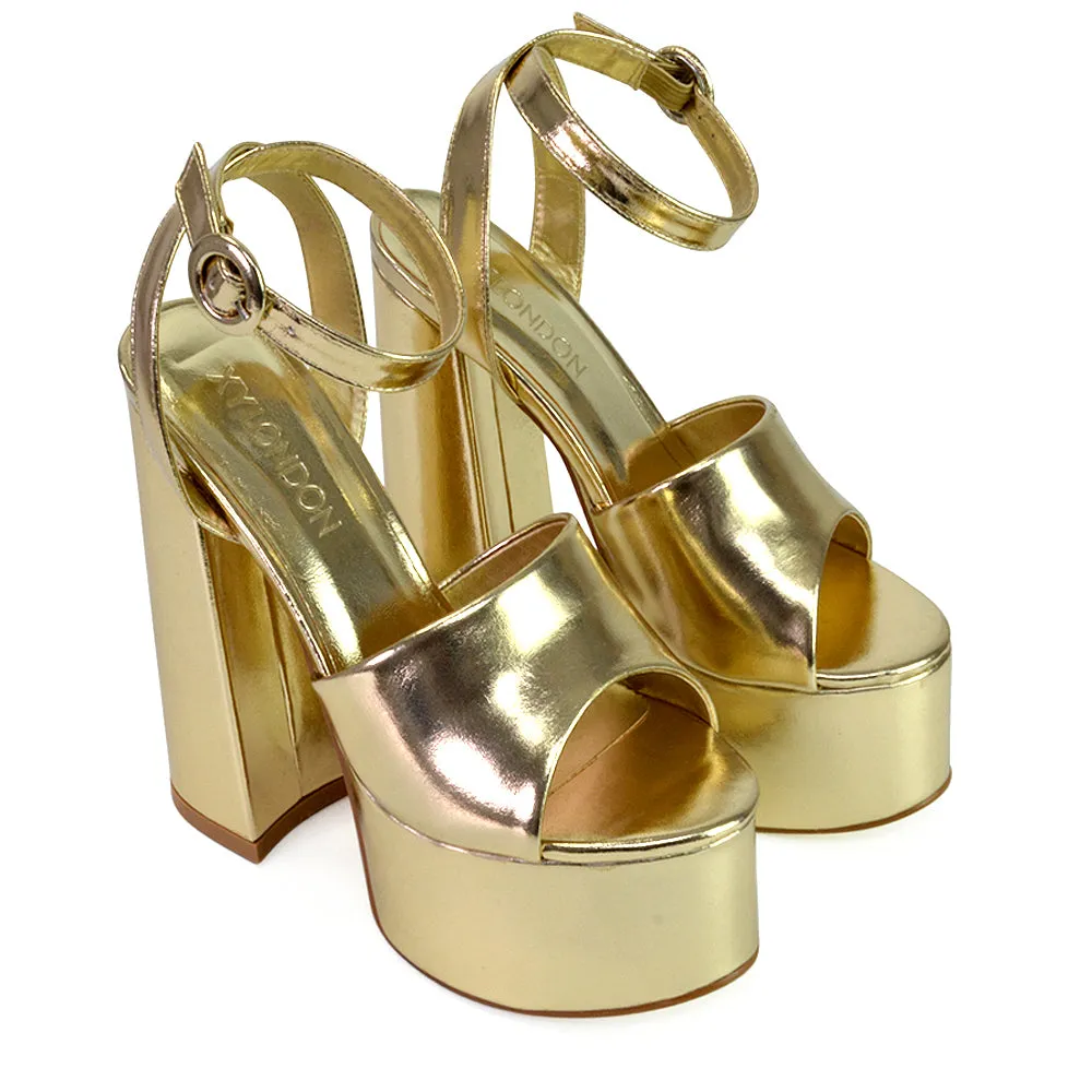 Pennie Strappy Super High Platform Shoes With a Chunky Heel in Gold