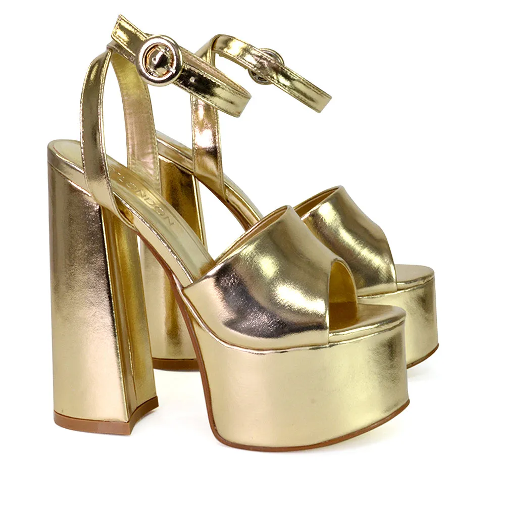 Pennie Strappy Super High Platform Shoes With a Chunky Heel in Gold