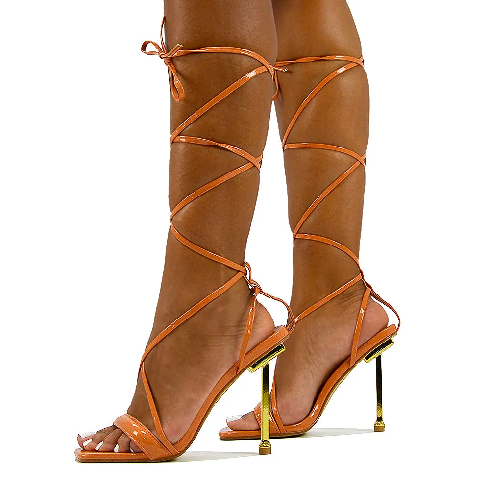 Rayne Lace Up Strappy Square Toe Metallic Stiletto High Heel Sandals in Orange Patent