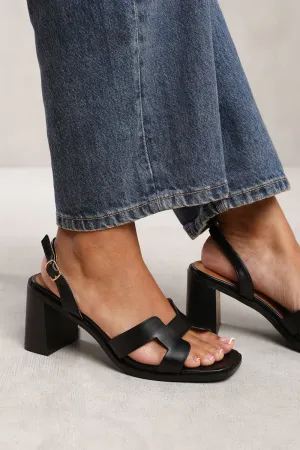 SORAYA STRAPPY SANDALS WITH BLOCK HEEL IN BLACK FAUX LEATHER